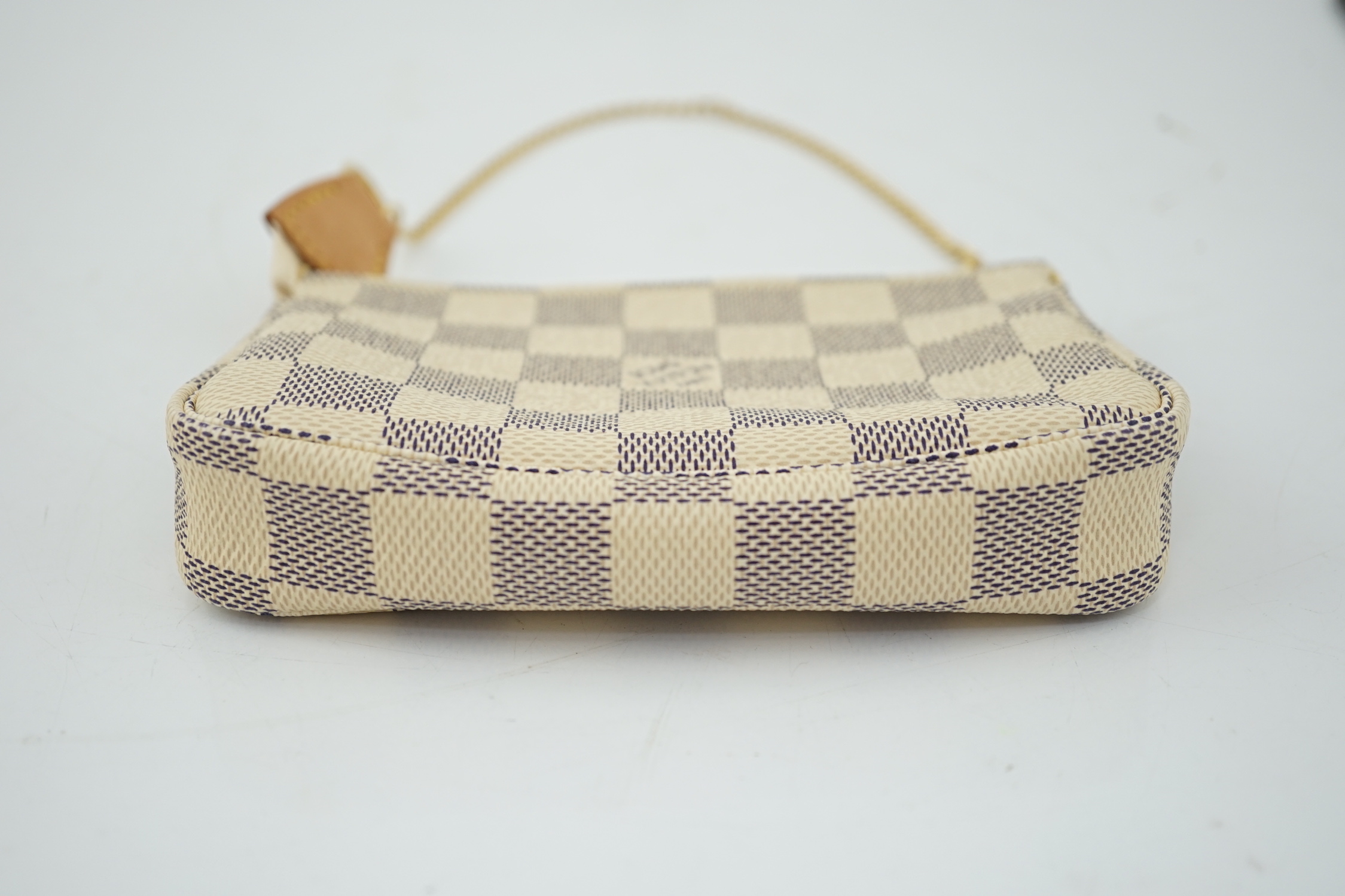 A Louis Vuitton white check mini handbag, height 10cm, width 15cm